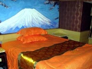 Junpin Yiwu Hotel Jivu Kültér fotó